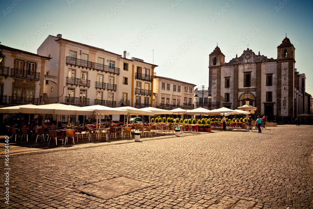 Wide angle shot of the Giraldo Square in Evora, Portugal on a sunny summer day