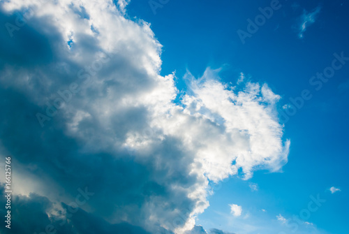 Dark clouds on a blue sky