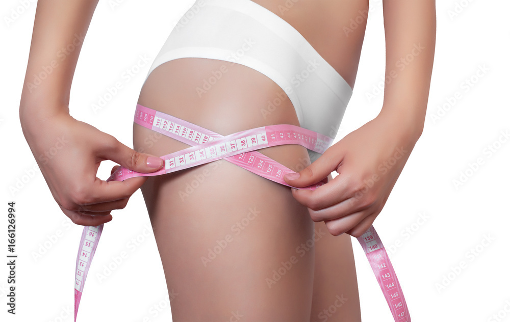 Woman Measuring Her Waist With A Yellow Measuring Tape, Isolated