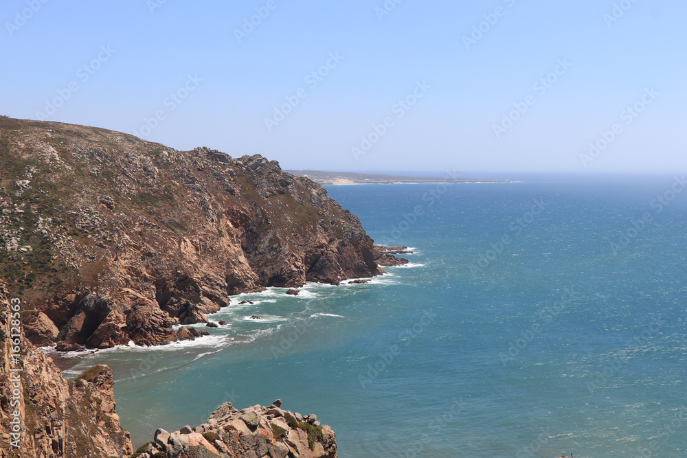 Summer Atlantic ocean rocky coastline near from roca cape. Cascais, Sintra Portugal Summer Atlantic ocean rocky coastline near from roca cape. Cascais, Sintra Portugal