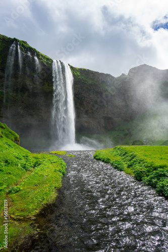 Iceland - Waterfalls of Seljalandsfoss with river at sunshine