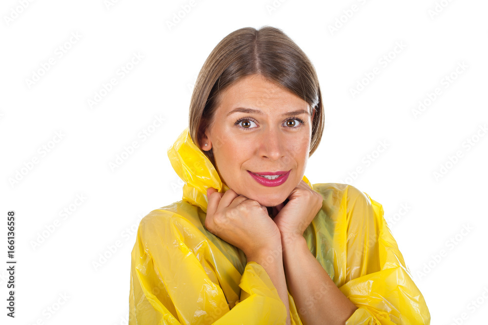 Attractive woman wearing yellow raincoat - isolated Attractive woman wearing yellow raincoat - isolated