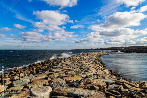 Obraz na plátně Blue sky and white clouds at Rockport Harbor, MA