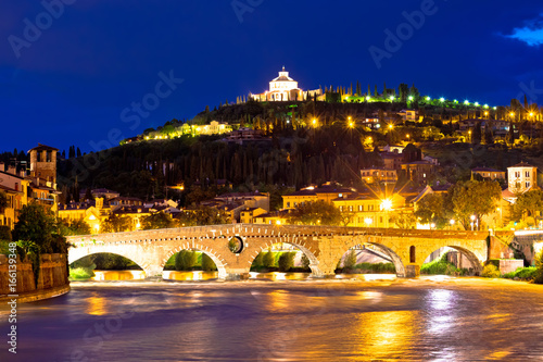 Madonna di Lourdes sanctuary and Adige river in Verona evening view