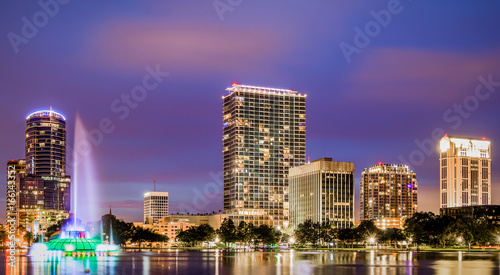 Nighttime cityscape of Lake Eola in downtown Orlando, Florida. photo