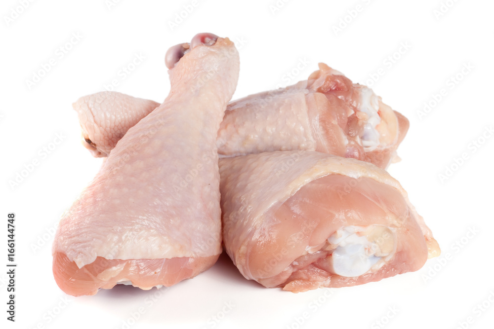 Three raw chicken drumsticks isolated on white background Three raw chicken drumsticks isolated on white background