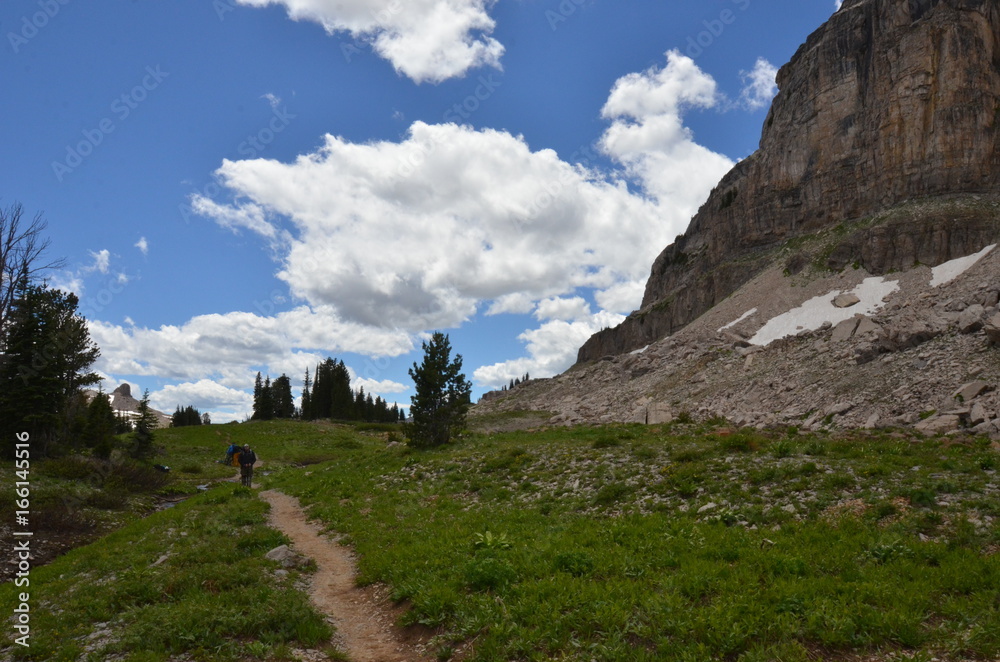 Hiker on Trail in Grand Teton National Park Hiker on Trail in Grand Teton National Park