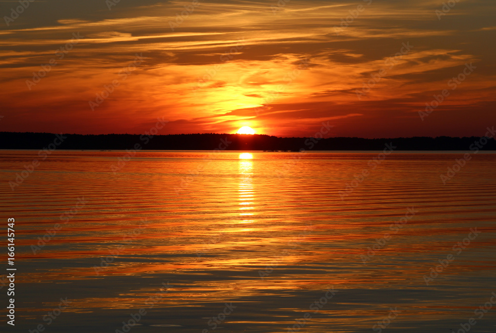 beautiful orange sunset on the lake