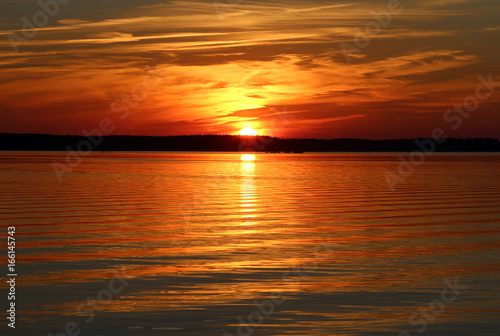 beautiful orange sunset on the lake