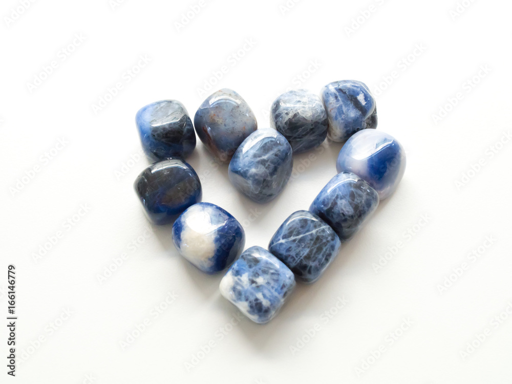 Heart of Tumbled jasper stones for crystal therapy treatments and reiki close up Heart of Tumbled jasper stones for crystal therapy treatments and reiki close up