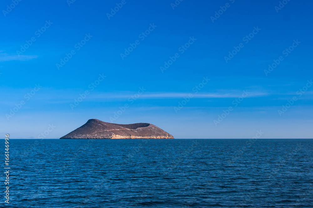An extinct volcano in the ocean. Pacific Ocean. Ecuador. Galapagos Islands. An extinct volcano in the ocean. Pacific Ocean. Ecuador. Galapagos Islands.