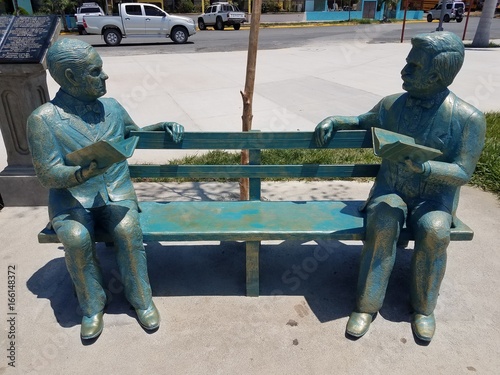 two poets talking estatue monument photo