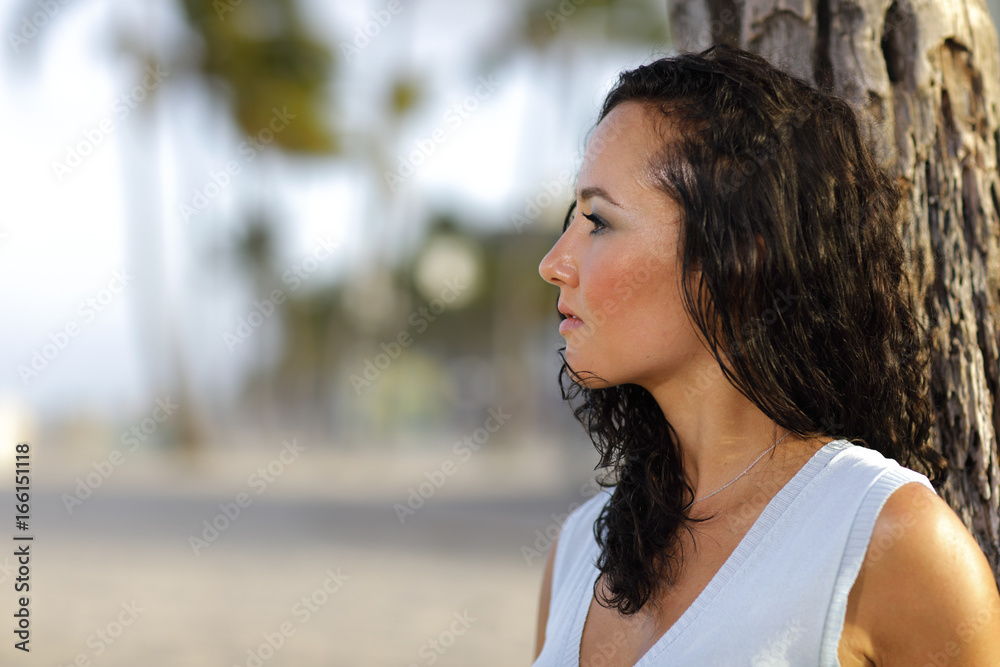 Headshot of a woman glancing away from camera Headshot of a woman glancing away from camera