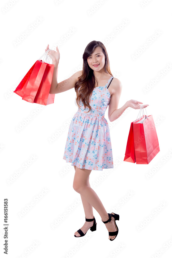 beautiful smiling asian young women with shopping sale bags isolated on white background. beautiful smiling asian young women with shopping sale bags isolated on white background.