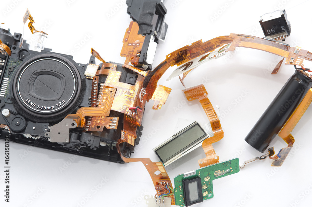 Parts of disassembled compact camera