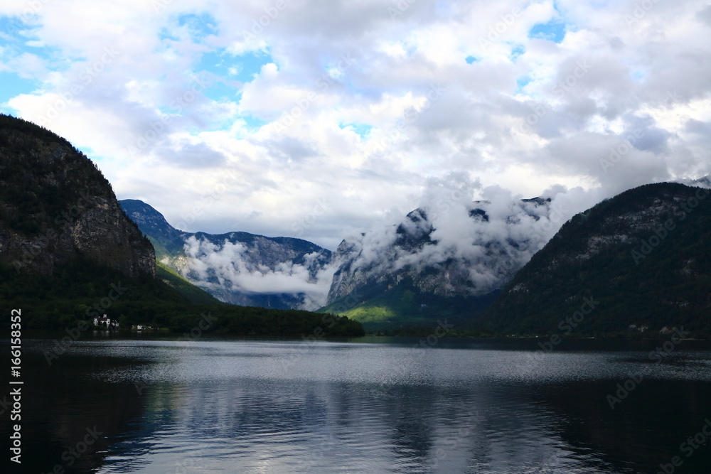 Photo of mountain and lake in Hallstatt of Austria