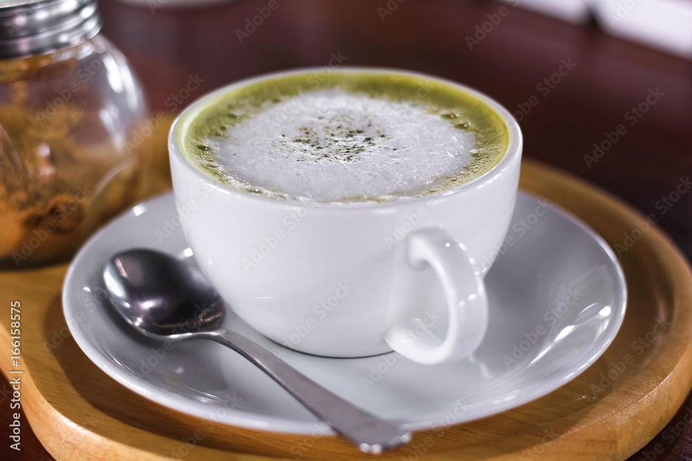 Hot matcha green tea latte glass with milk Hot matcha green tea latte glass with milk