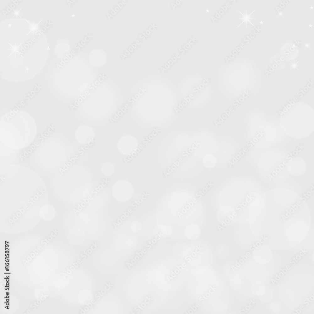 Silver christmas background with bokeh lights Silver christmas background with bokeh lights