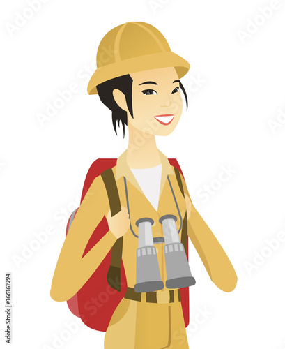 Young asian traveler with backpack and binoculars.
