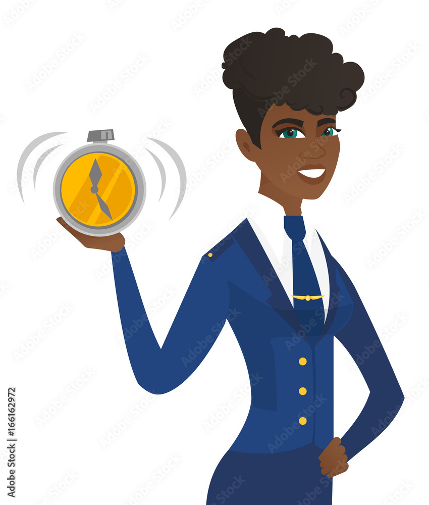 Arican-american stewardess holding alarm clock. Arican-american stewardess holding alarm clock.