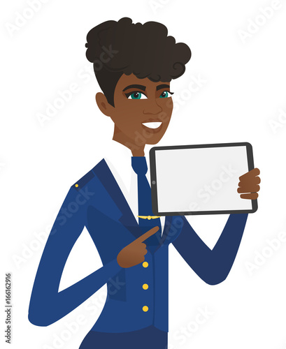 Young african stewardess holding tablet computer.
