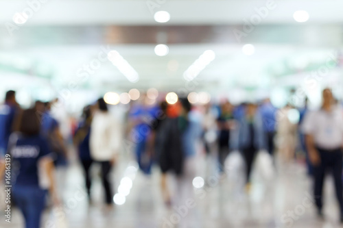 crowd people traveler in airport terminal, image blur used background