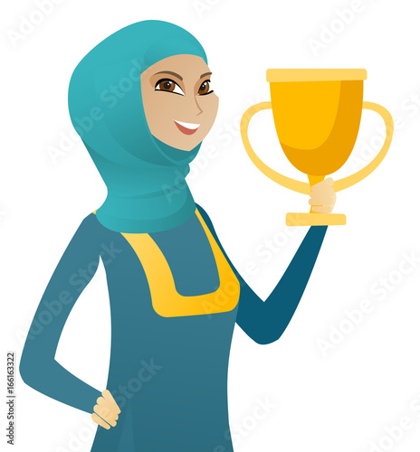 Young muslim business woman holding a trophy.