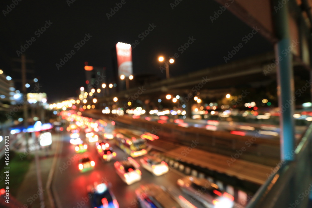 Abstract circular bokeh motion lens blur backround of city and street light or Bokeh light from car in street in night time. Bangkok Expressway Thailand. Abstract circular bokeh motion lens blur backround of city and street light or Bokeh light from car in street in night time. Bangkok Expressway Thailand.