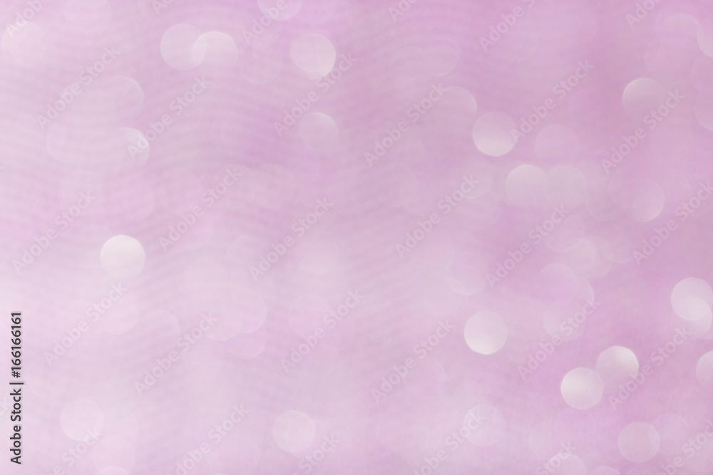 Pink glittering lights. Blurred abstract background.