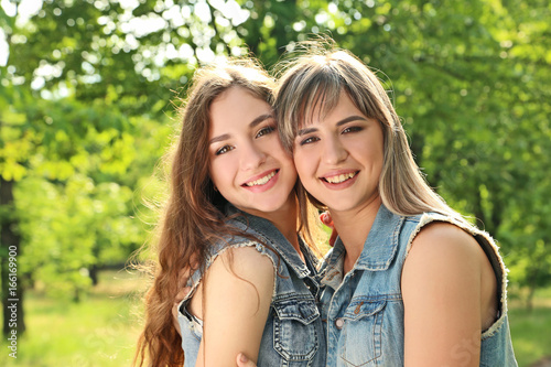 Portrait of two young woman in the park
