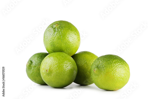 Ripe limes isolated on white background