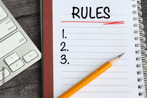 Fotografie list of rules on notebook with desk background