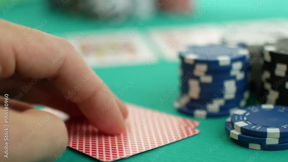 The ace and the king in his hand. Royal flush in poker. The ace and the king in his hand. Royal flush in poker.