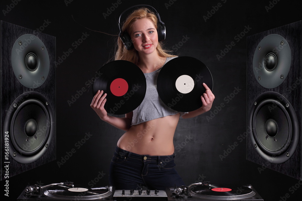 sexy DJ woman against blue background. Stock Photo | Adobe Stock