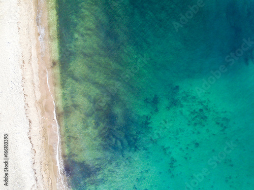 Aerial view of sandy beach and ocean