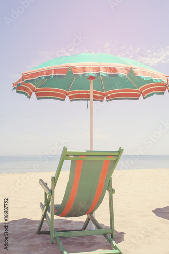 Fototapeta Naklejka Na Ścianę i Meble -  Beach chair and parasol sushade