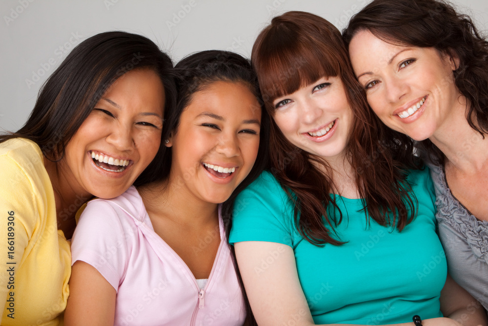 Diverse group of mothers and daughters. Diverse group of mothers and daughters.