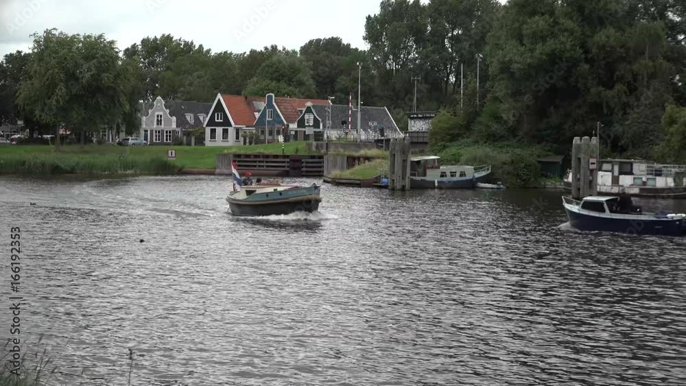 Small boats crossing on canal Small boats crossing on canal