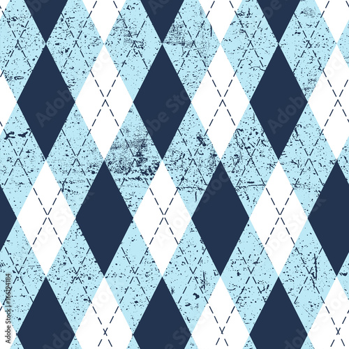Seamless argyle aged pattern. Traditional diamond check print in moderate blue, soft blue and white with black stitch and grunge texture. Grunge vintage seamless background.