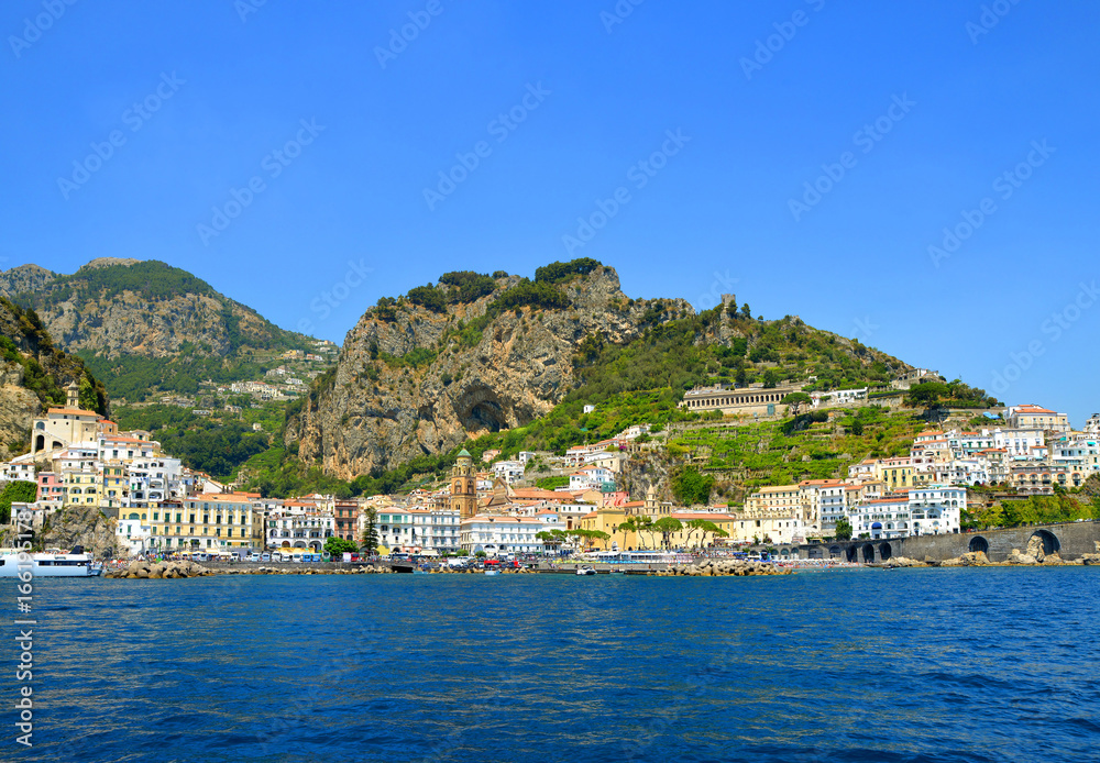 View of the beautiful town of Amalfi at famous coast in gulf of Salerno. Campania region, Italy.