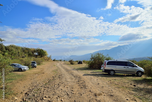 The cars in the Parking lot on the mountain road in the valley of ghosts in the vicinity of Alushta