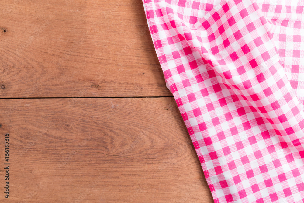 Tablecloths on the wooden table background Tablecloths on the wooden table background