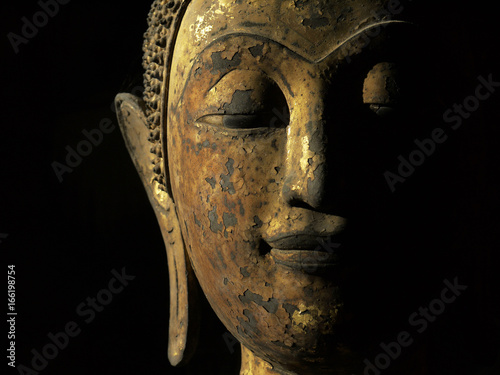 old gold buddha face