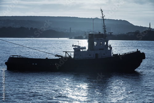 Tug boat is underway. Black sea, Varna harbor