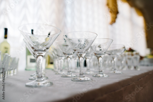 Many glasses of martini on the table, colorful