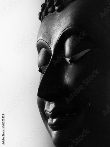 old Buddha face black and white
