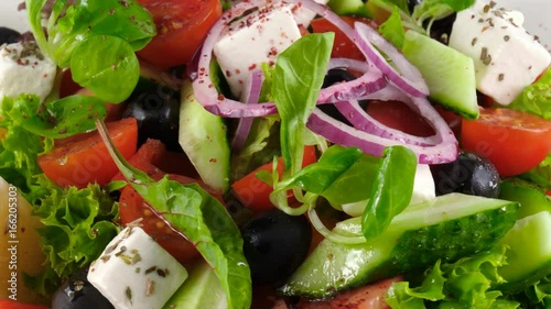 Close-up view of Greek salad with feta cheese, fresh vegetables and olives, 4K, ProRes codec, 422 HQ, ISO 100
