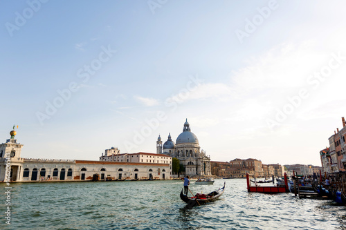 Gondola on Canal Grande with Basilica di Santa Maria della Salute in the background, Venice, Italy © Angelov