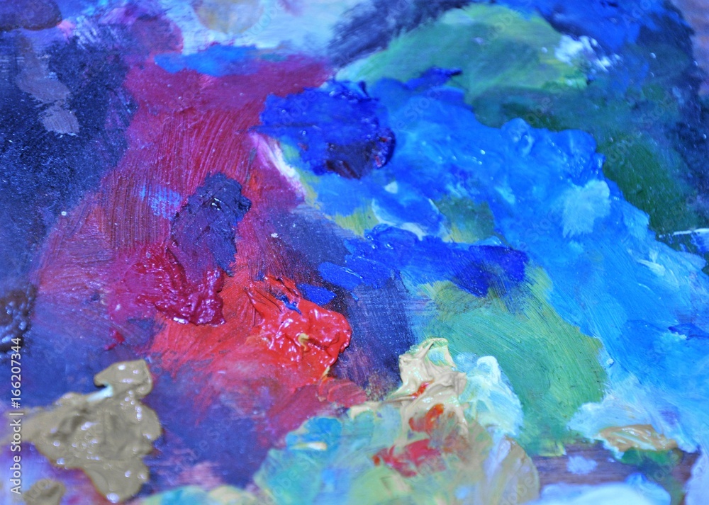Blue and red abstract painters palette close up photo