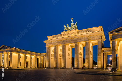 The Brandenburg Gate at the blue hour; At the early hour before dawn, the Pariser Platz at the Brandenburg Gate is still without people